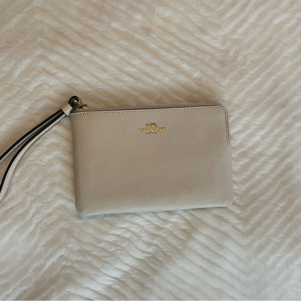 Coach Ivory Wristlet with Gold Accents